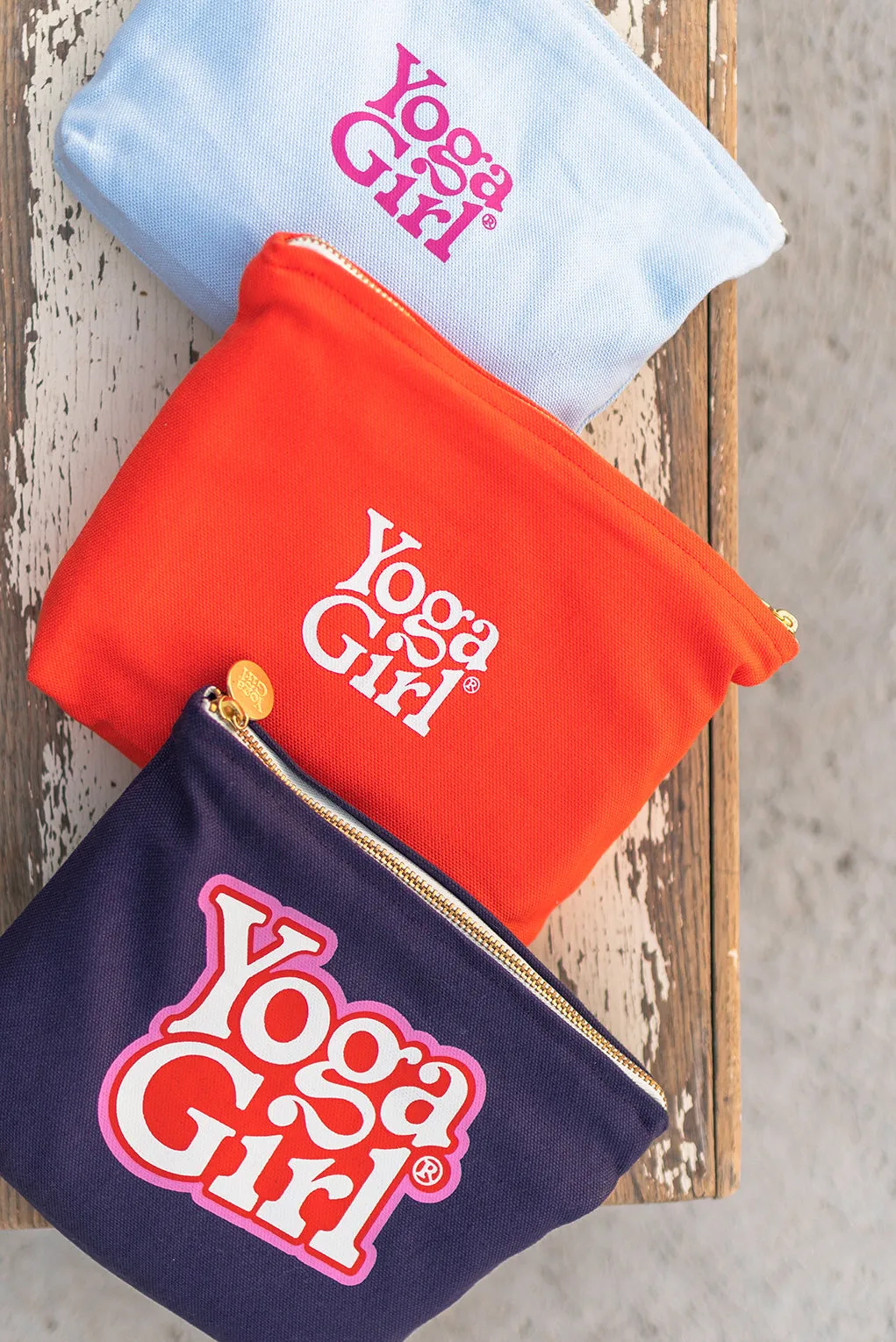 Navy pouch with Yoga Girl logo
