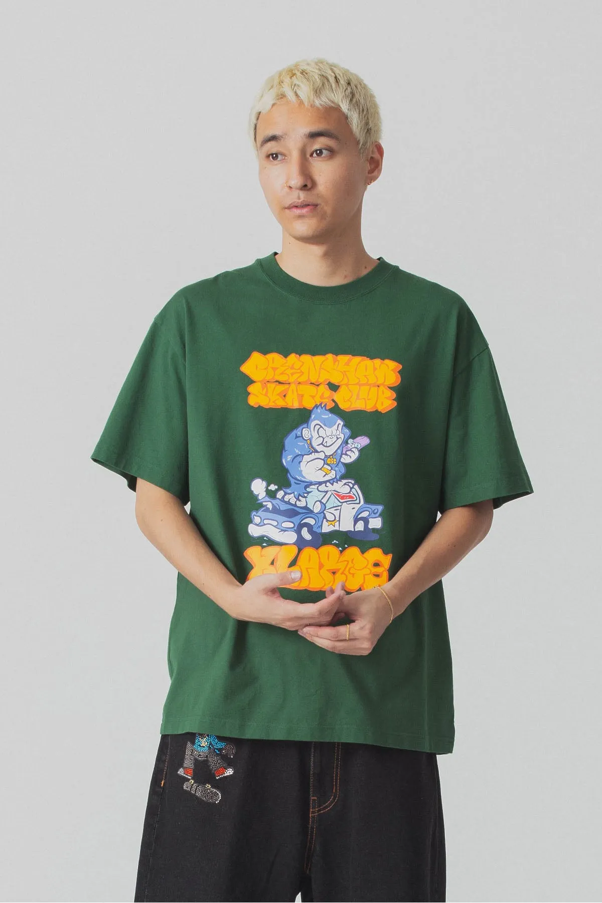 XLARGE x CSC VANDALISED POLICE CAR TEE - GREEN