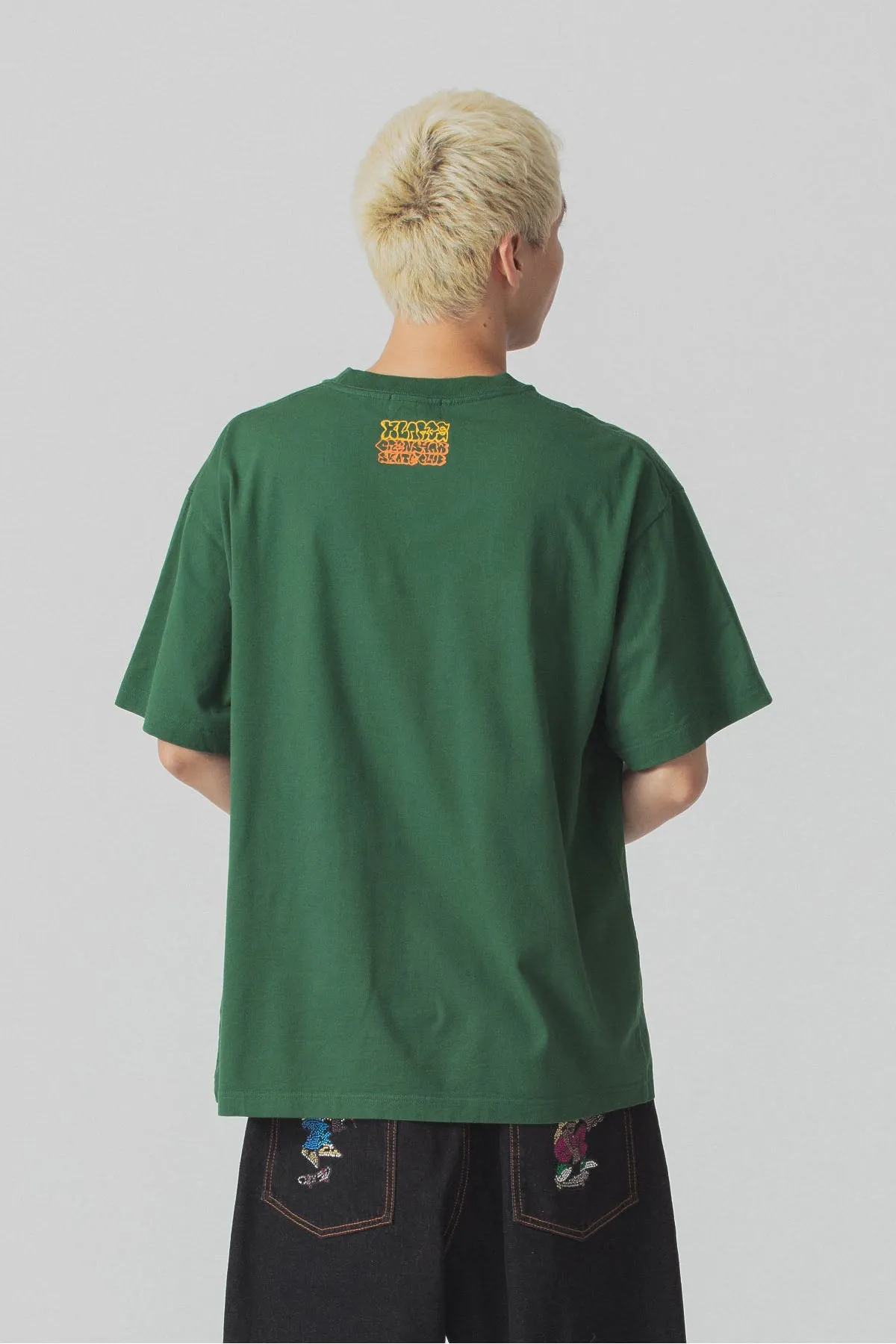 XLARGE x CSC VANDALISED POLICE CAR TEE - GREEN